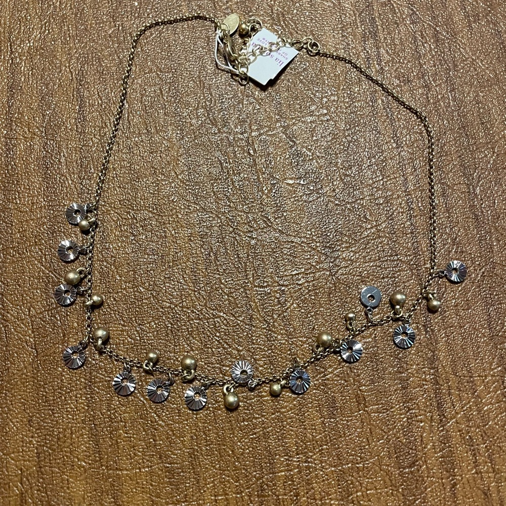 Elegant Gold and Silver Necklace